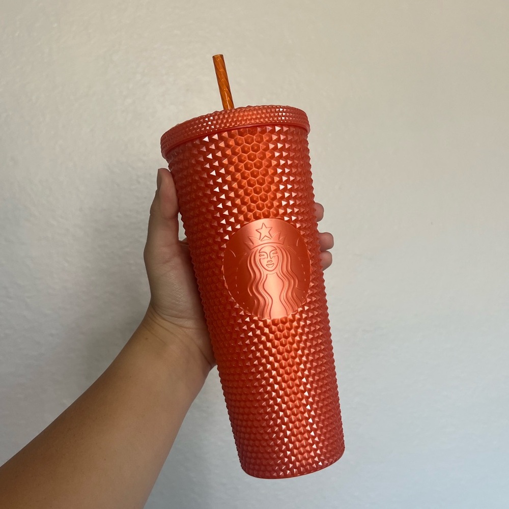 Orange spikes Starbucks tumbler